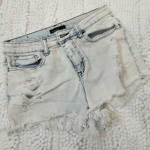 High rise distressed denim shorts